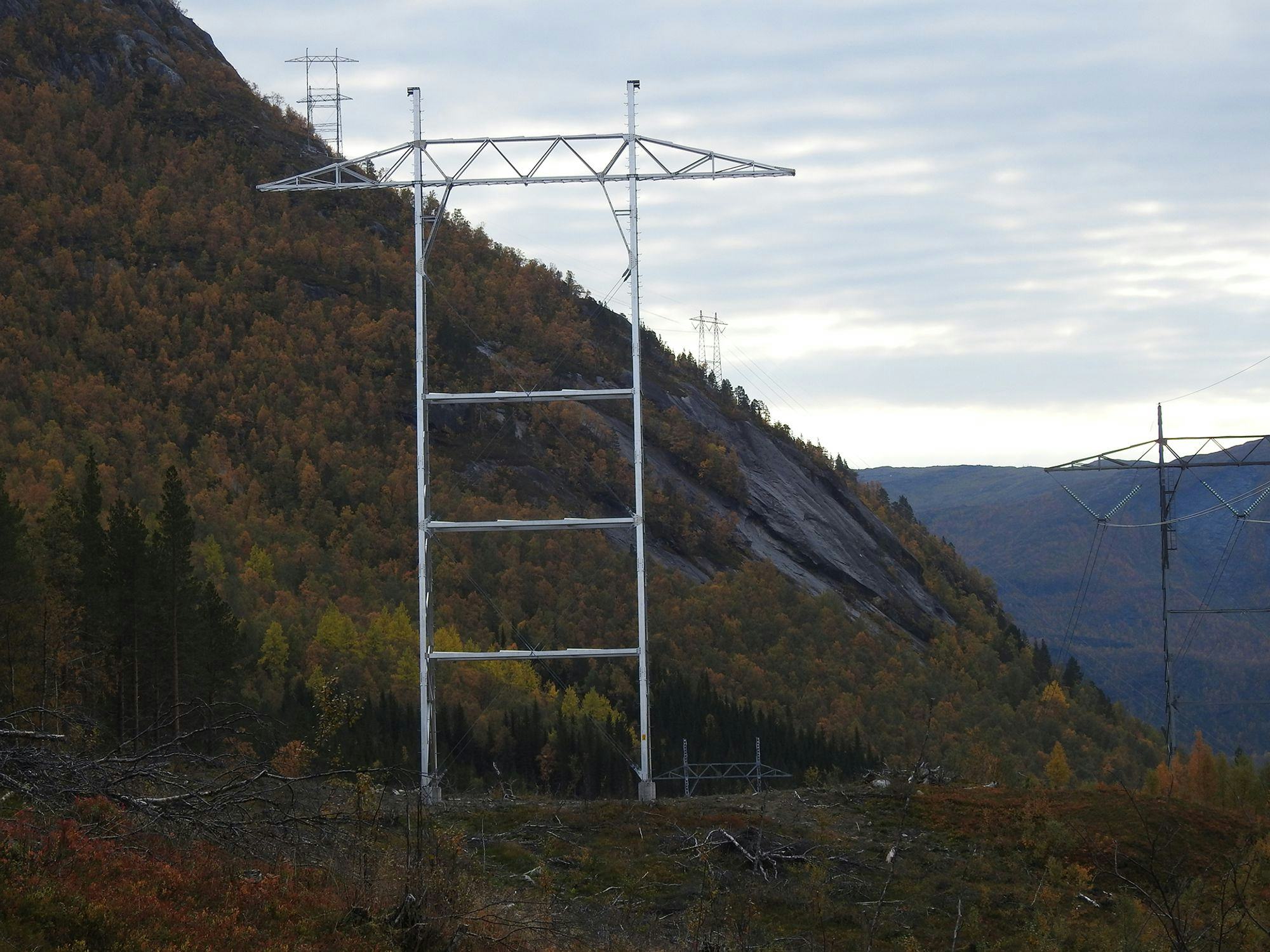 Single aluminum tower in rough terrain setting