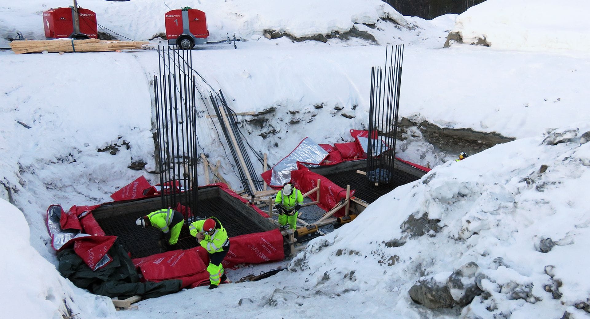 men in safety clothing working on power lines