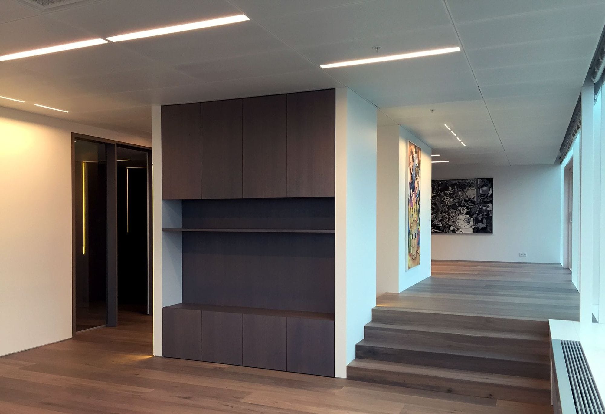 Corridor with stairs and interior made of dark wood
