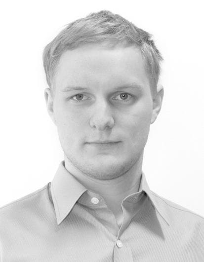 grayscale picture of a man in a shirt