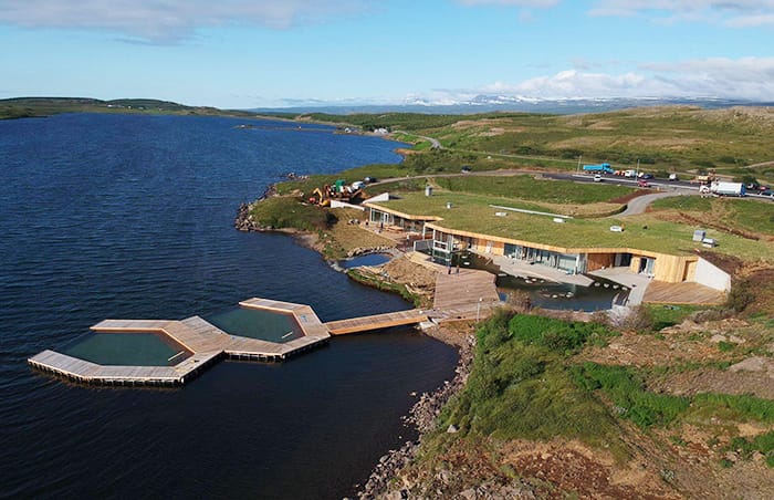  geothermal spa surrounded by greenery and also spread out at the bank of a beautiful lake