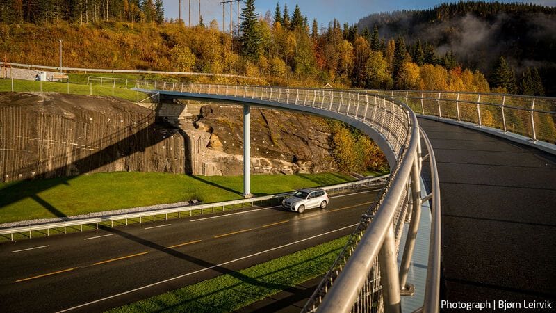 Footbridge near a forest in Norway.