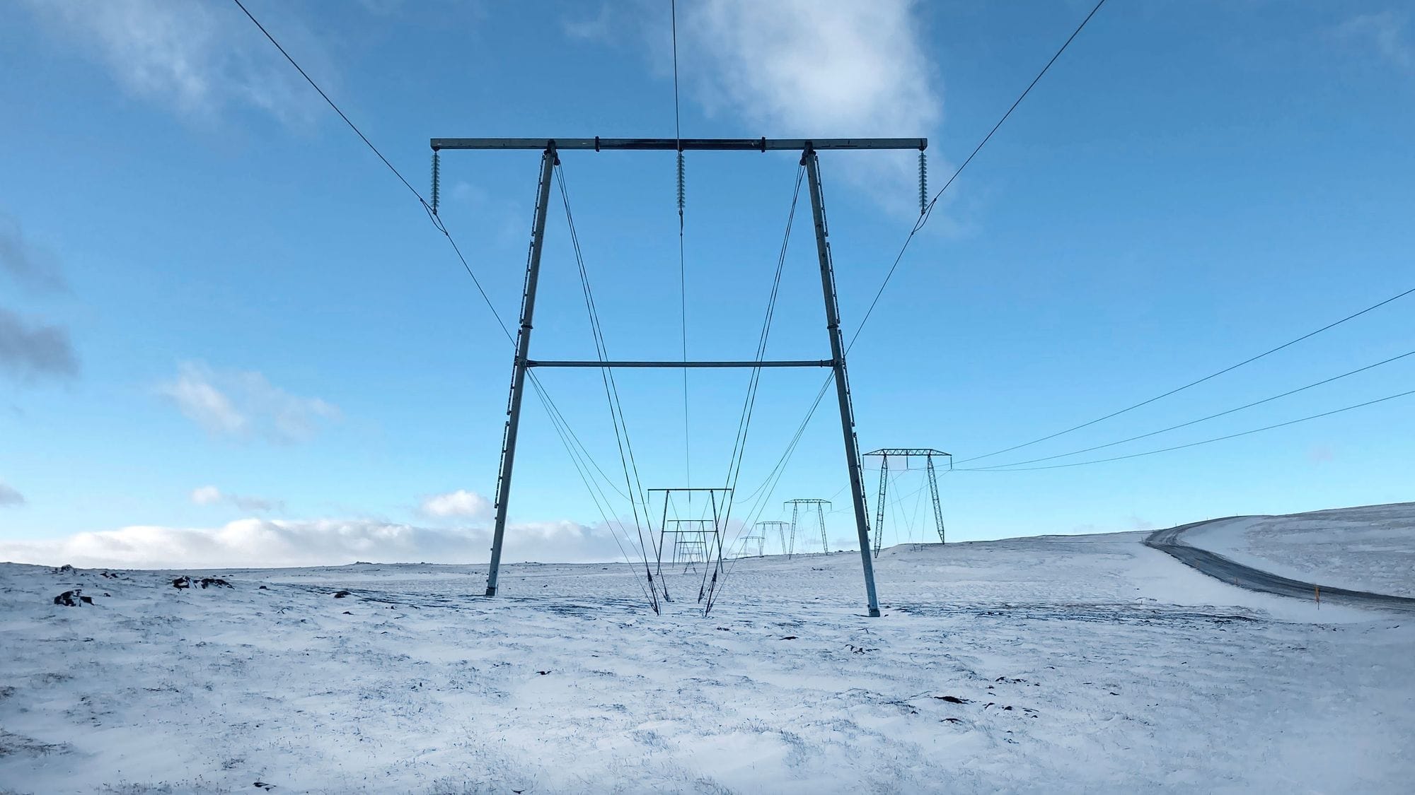 Power masts in snowy environment
