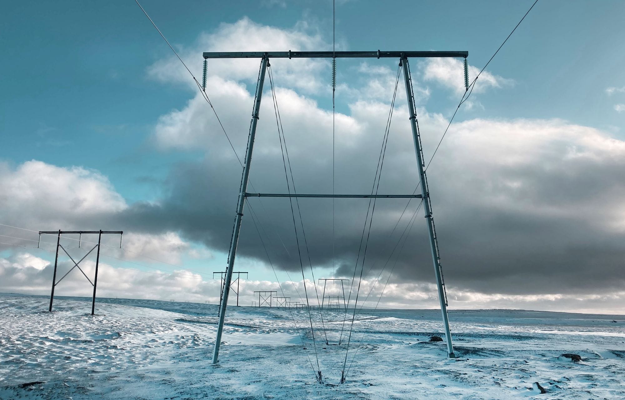 Power mast in a snowy environment