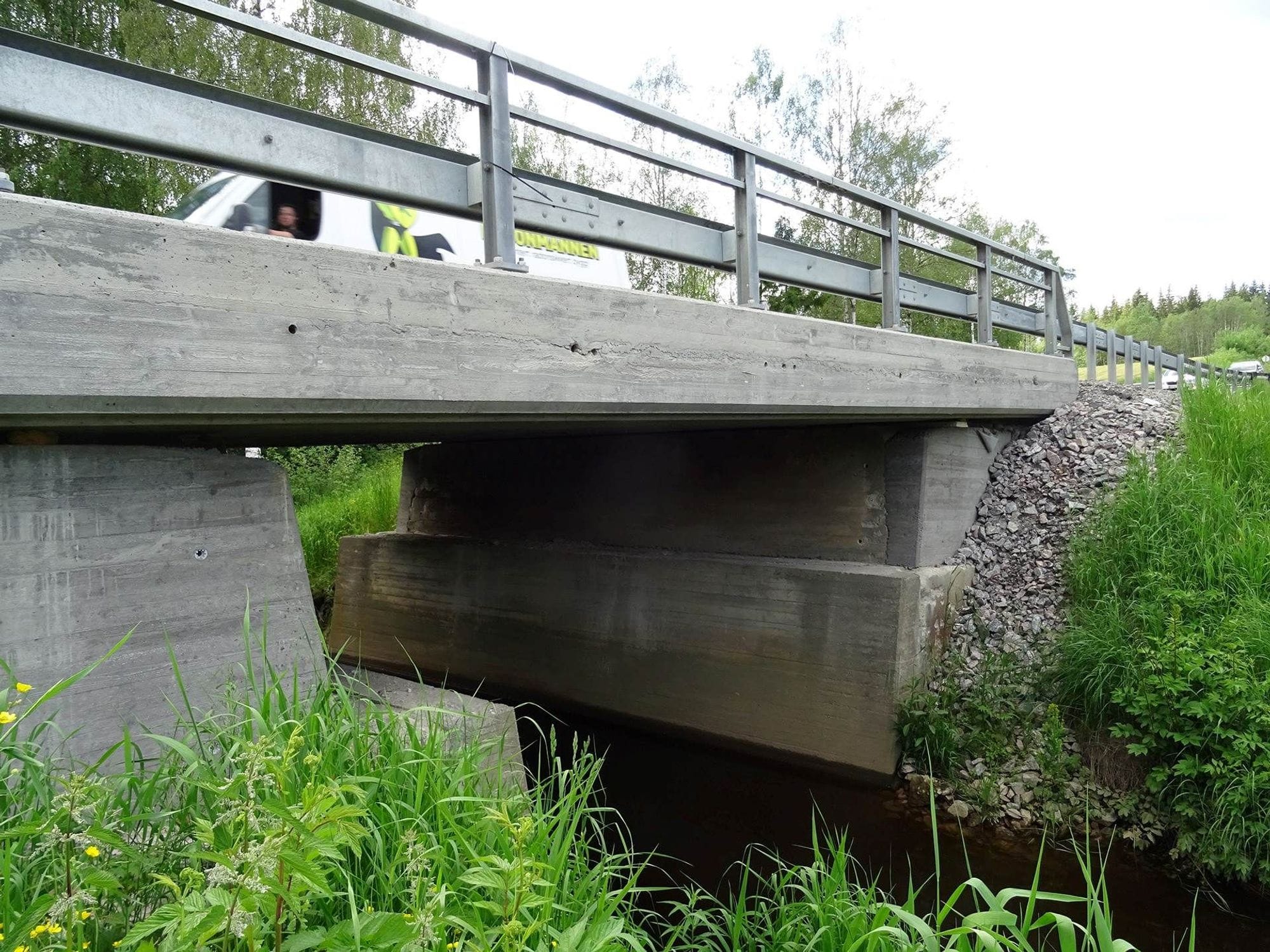 The bridge after the replacment. New steel rail and concrete bridge.