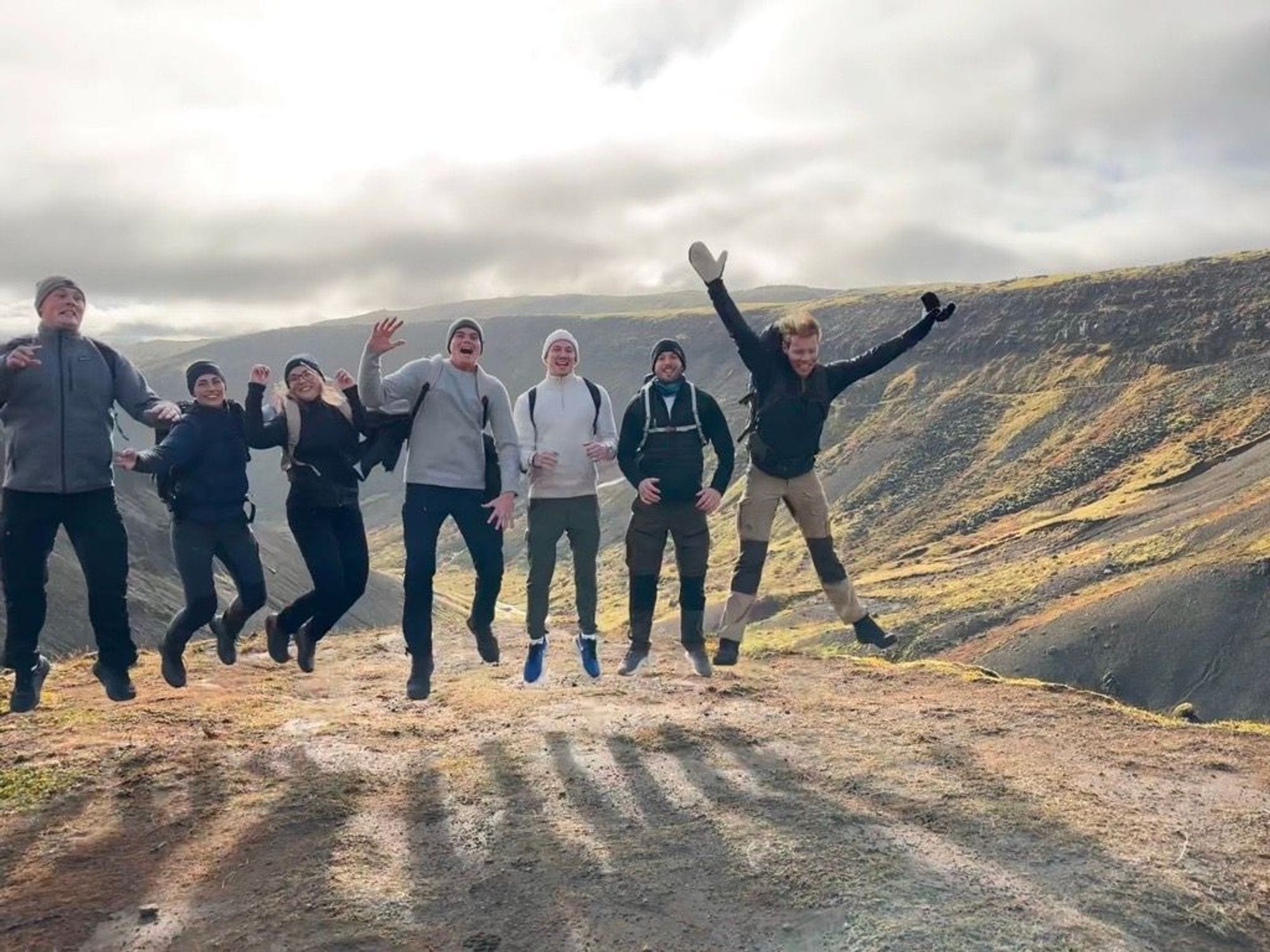 photo of 6 people posing in a hike