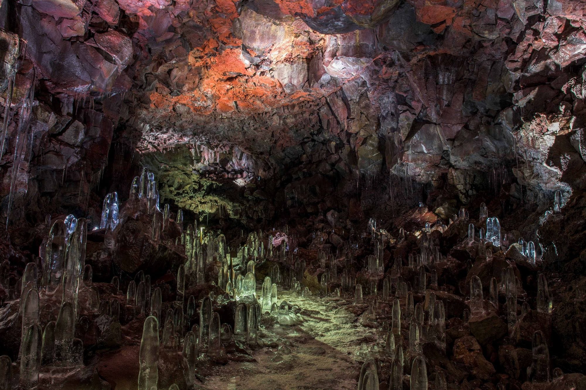 Inside a red, purple and green cave