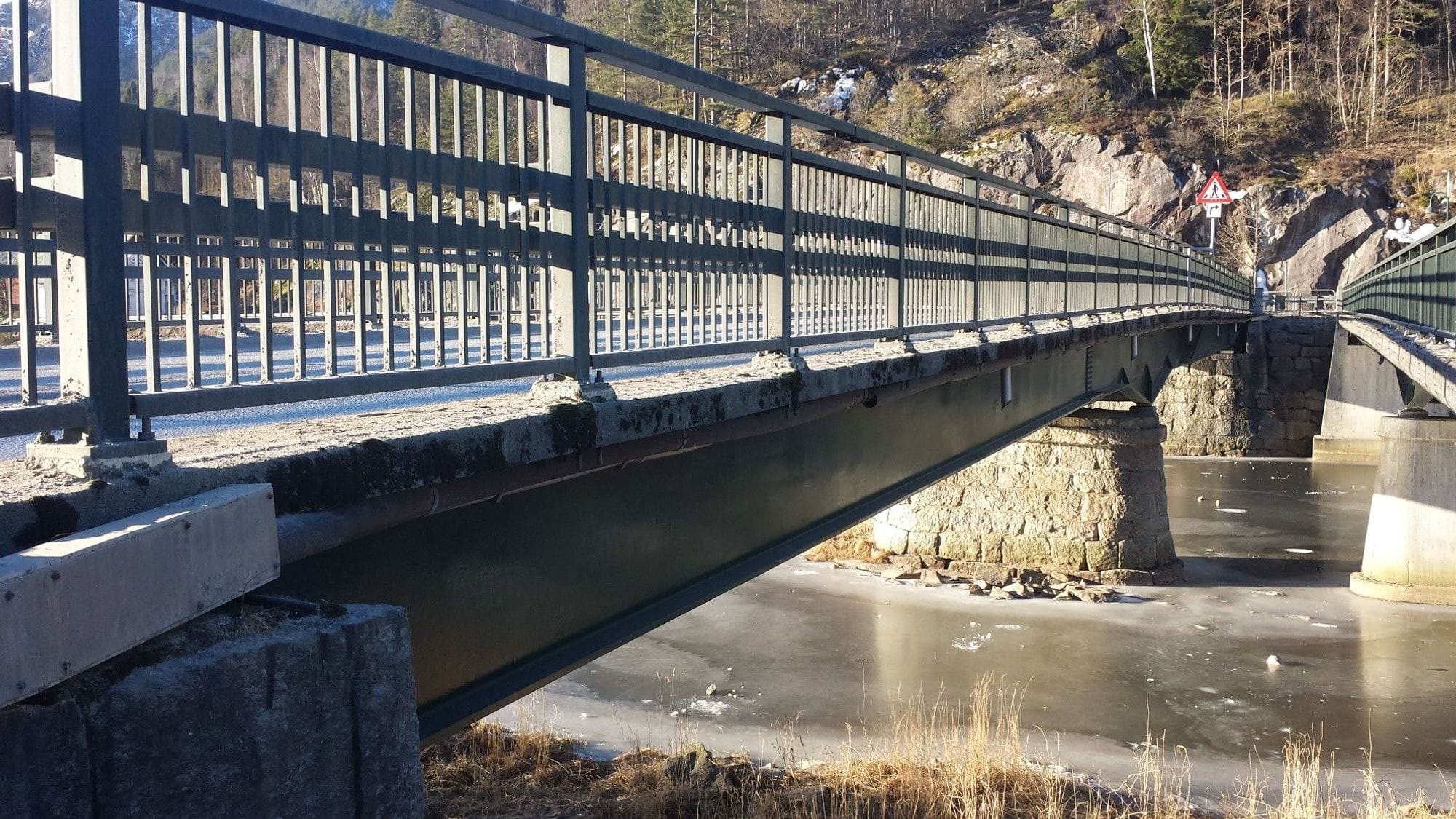Closeup of Tonstad bridge before reinforcement. Closeup of a steel rail.
