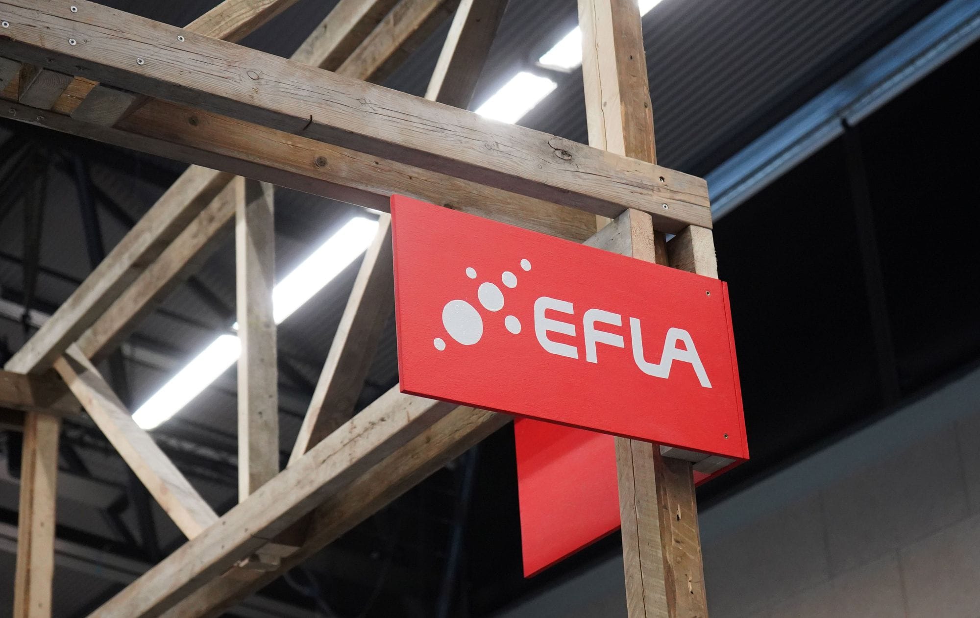 EFLA logo on a wooden structure