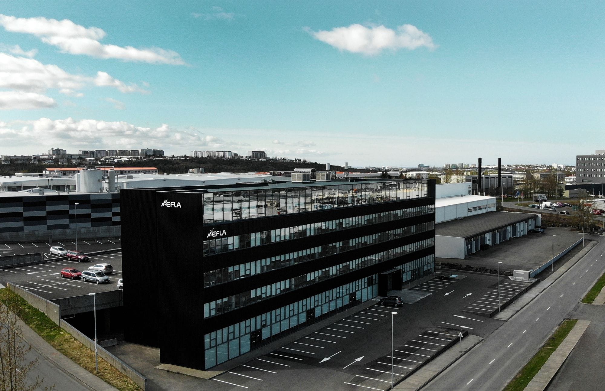 A modern black building seen from above